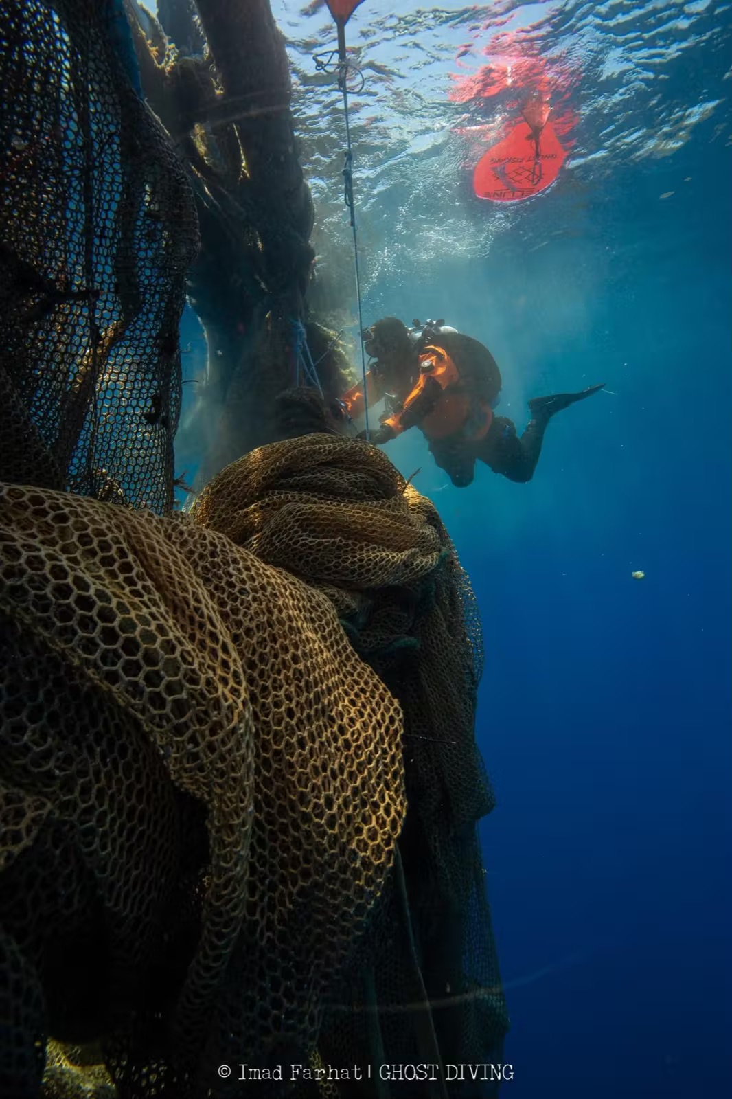 Imad Farhat Ghost Diving conservation diver retrieving abandoned fish farm nets Ithaka Greece